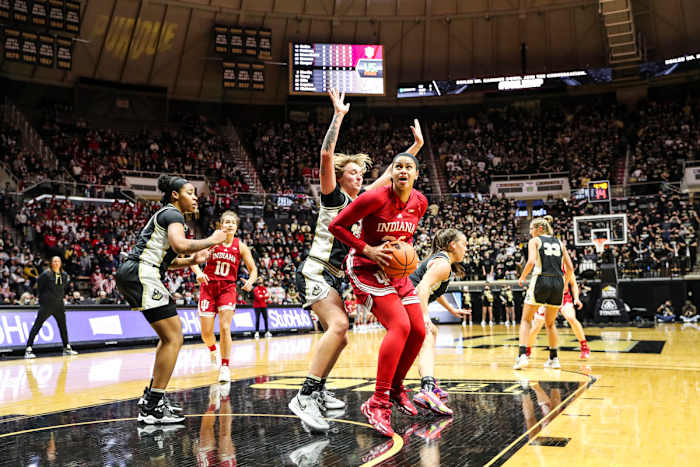 Kiandra Browne is pressured by a Purdue defender.
